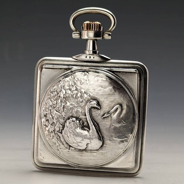 Around 1910 Antique Omega pocket watch with swan engraving square silver side case works well